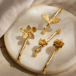 Carica l'immagine nella visualizzazione Galleria, Brass flower and branch handles styled on cabinetry