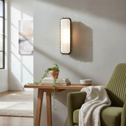 Applique da parete Glowvera - Design a cornice metallica ondulata Applique moderna con paralume in vetro per corridoio