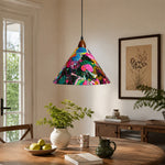 Carica l'immagine nella visualizzazione Galleria, Painted floral pendant above rustic oval dining table with green plants