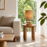 Cargar imagen en el visor de la Galería, Natural wood table lamp beside a sofa in a bright living room