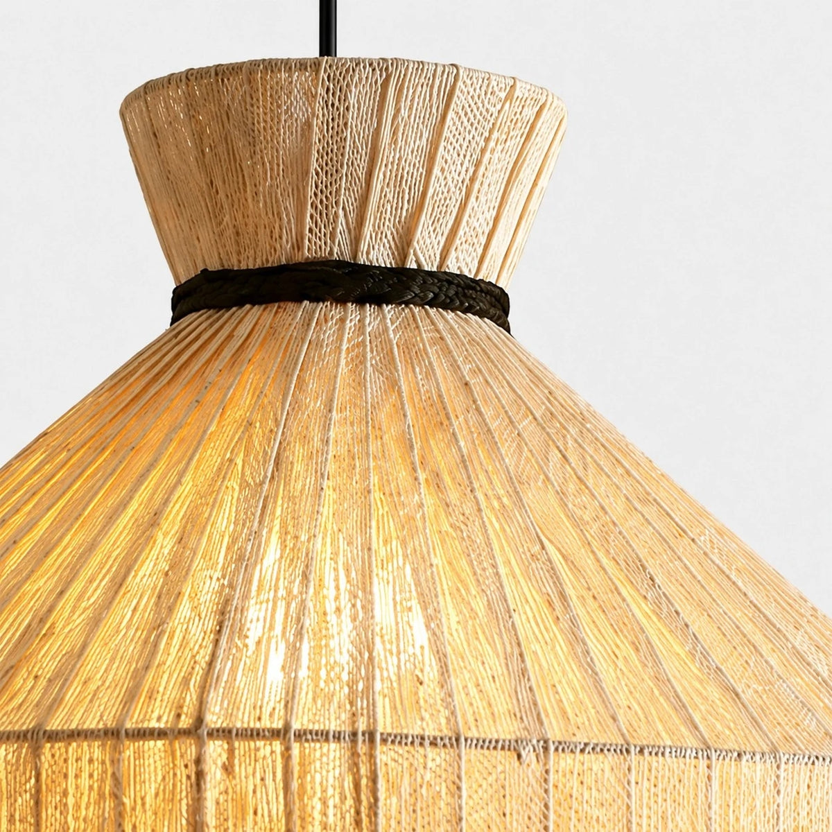 Close-up of top collar and black accent band on woven pendant shade