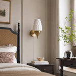 Cargar imagen en el visor de la Galería, Antique brass Art Deco wall sconce beside a bed