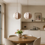 Cargar imagen en el visor de la Galería, Cream polka dot pendant lamps over a round dining table