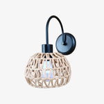Cargar imagen en el visor de la Galería, Shade A woven rattan wall sconce in matte black