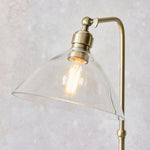 Afbeelding laden in galerijweergave, Clarione Art Deco vloerlamp met heldere glazen kap en metalen voet