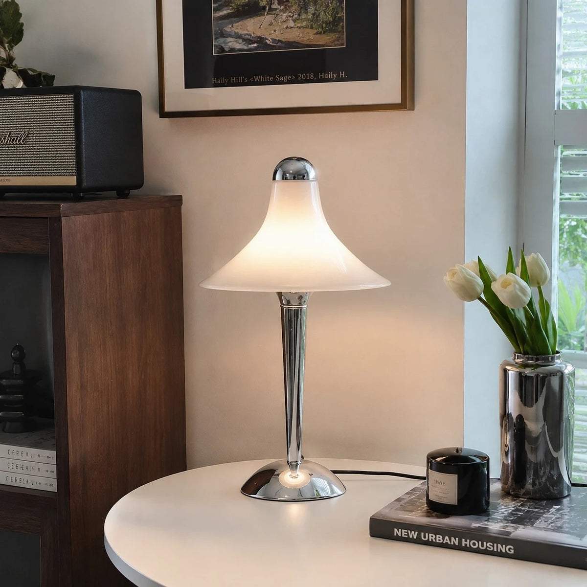 White table lamp on a round living room table