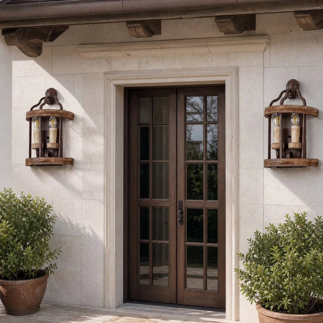 Rustic wall sconces beside an entry door