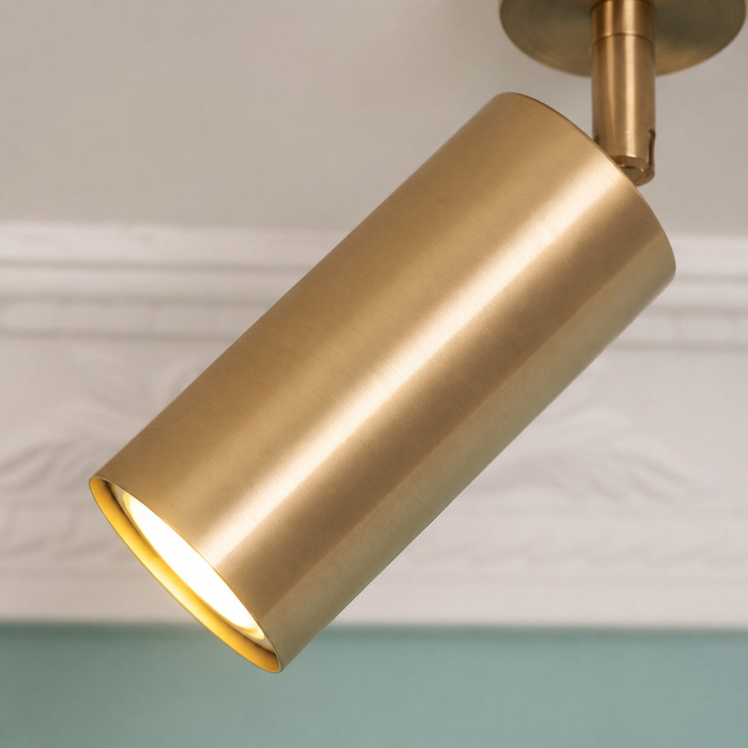 Brushed brass cylindrical spotlight shade detail
