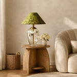 Load image into Gallery viewer, Floral glass table lamp beside a sofa in a living room