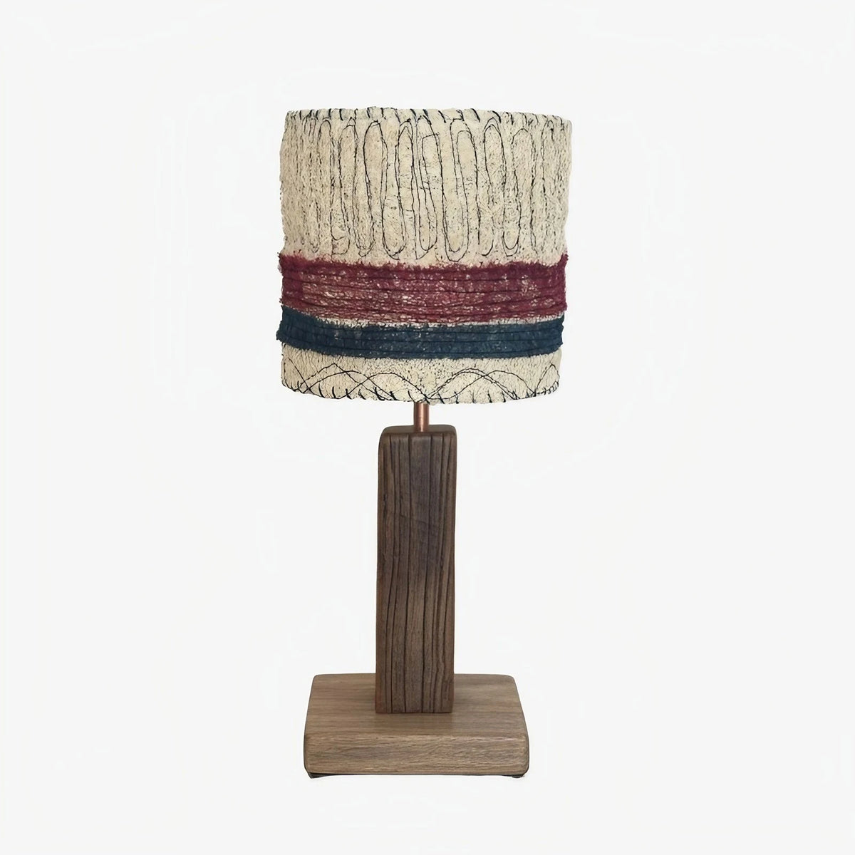 Red and blue stripe loofah table lamp on a white background