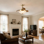 Bild in die Galerieansicht laden, Antique brass retractable ceiling fan light in a living room