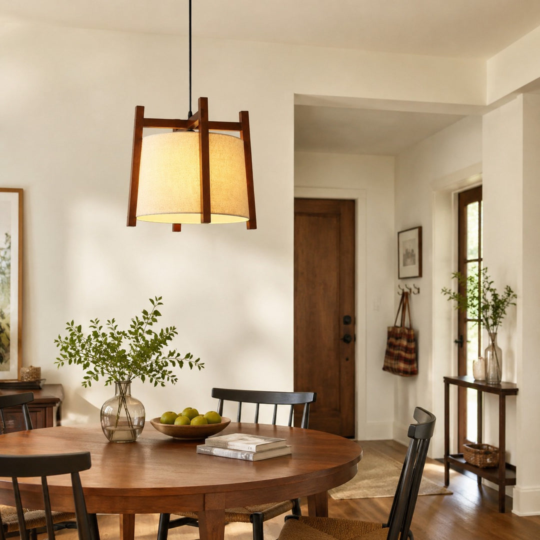 Single walnut fabric pendant light above a dining table