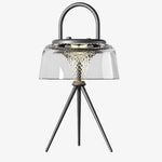 Cargar imagen en el visor de la Galería, Clear solar garden lantern with black handle and tripod legs