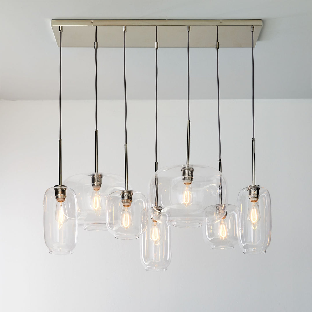 Lumivelle Sculptural 7-Light Chandelier – Adjustable Height Modern Glass Pendant