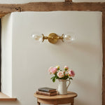 Load image into Gallery viewer, Lumio Globe Sleek Glass Globe Wall Lamp for Bathroom &amp; Bedroom
