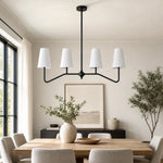 Load image into Gallery viewer, Strellux black linear chandelier in a dining room scene