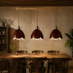 Cargar imagen en el visor de la Galería, Three brown leather pendant lights in a restaurant setting