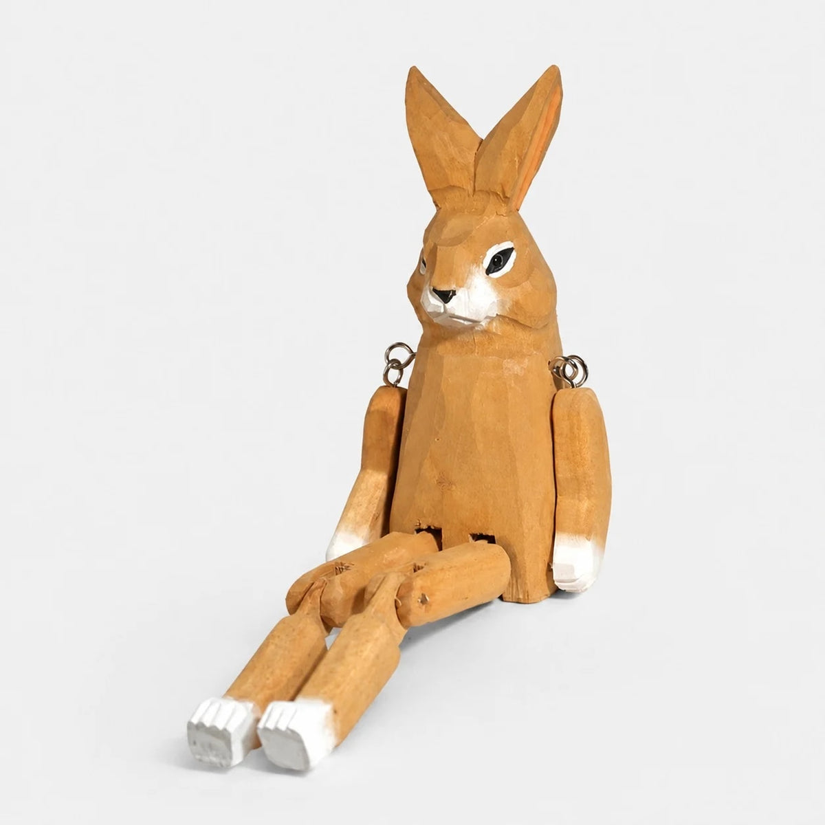 Hand-carved wooden rabbit ornament