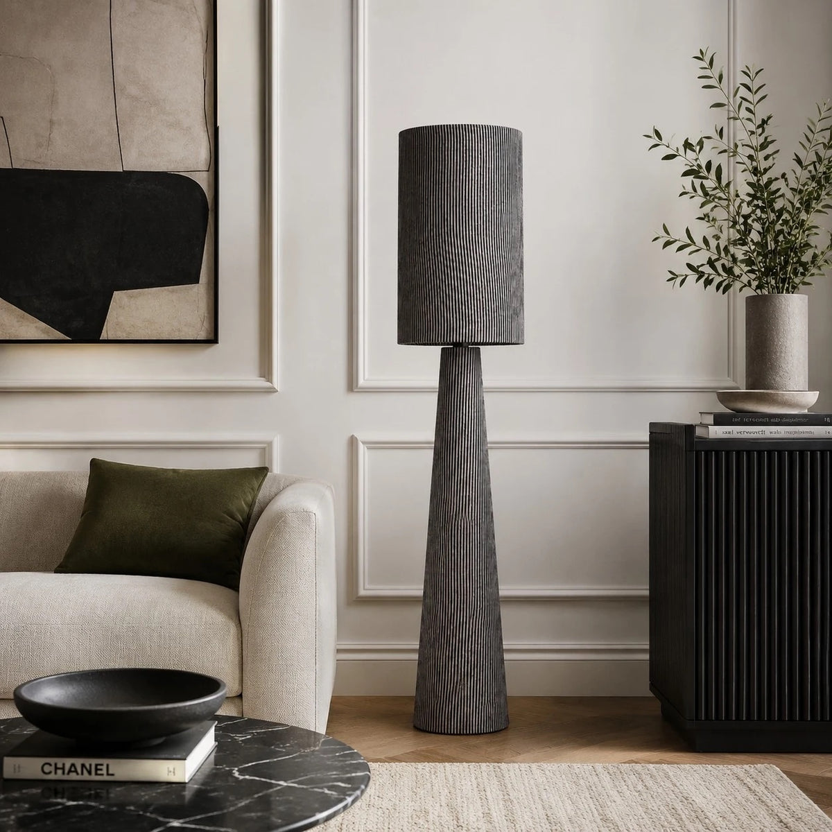 Gray striped floor lamp styled in a sofa corner