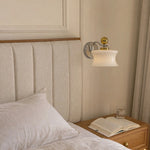 Cargar imagen en el visor de la Galería, Cream glass wall lamp installed beside a bed