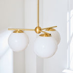 Load image into Gallery viewer, Alessora Brass Milk Glass Chandeliers- Great for Covered Outdoor Areas
