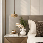 Cargar imagen en el visor de la Galería, Leather petal pendant light above a bedroom nightstand