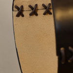 Cargar imagen en el visor de la Galería, Leather pendant edge lacing close-up