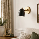 Carica l'immagine nella visualizzazione Galleria, Black and gold wall sconce in a styled room