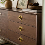 Afbeelding laden in galerijweergave, Antique brass swallow handles on a wood dresser