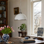 Cargar imagen en el visor de la Galería, White ribbed pendant light in a bright dining room