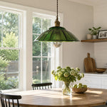 Cargar imagen en el visor de la Galería, Green glass pendant light in a bright dining room
