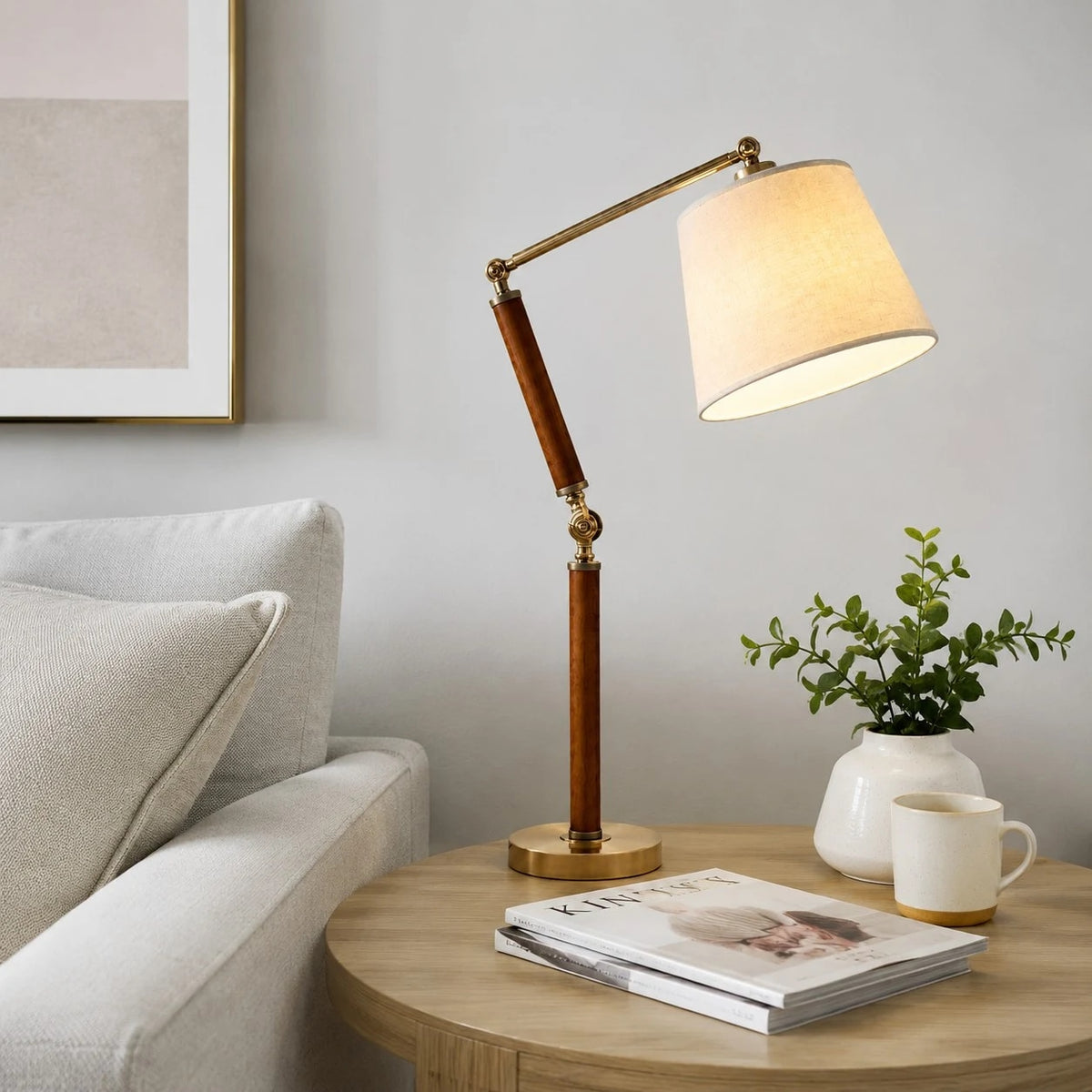 Warm fabric shade table lamp on a living room side table