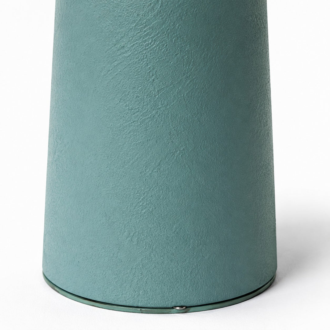Close view of the textured green ceramic lamp base
