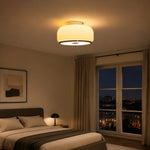 Afbeelding laden in galerijweergave, Amber glass ceiling light illuminating a warm bedroom
