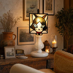Cargar imagen en el visor de la Galería, Smoke purple cat stained glass lamp glowing on a vintage console table