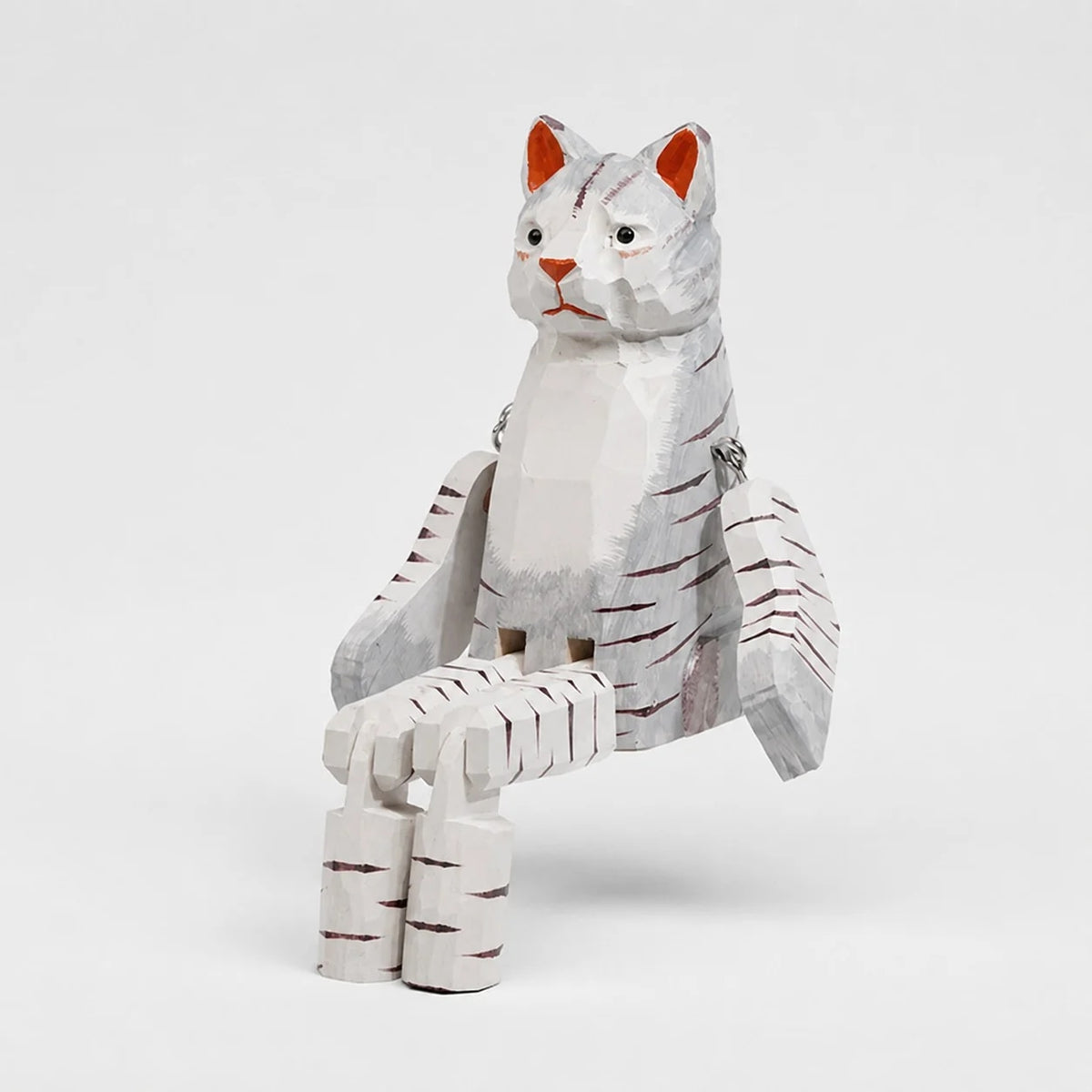 Hand-carved wooden cat ornament