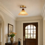 Cargar imagen en el visor de la Galería, Amber flush mount ceiling light near an arched doorway