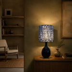 Afbeelding laden in galerijweergave, Blue gold patterned fabric table lamp in a living room