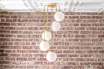 Load image into Gallery viewer, Glorica Glass 5 Globe Chandelier - Brass and Opal Glass Vintage Pendant Light
