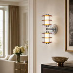 Załaduj obraz do przeglądarki galerii, Vertical amber acrylic chrome wall lamp in an entryway setting