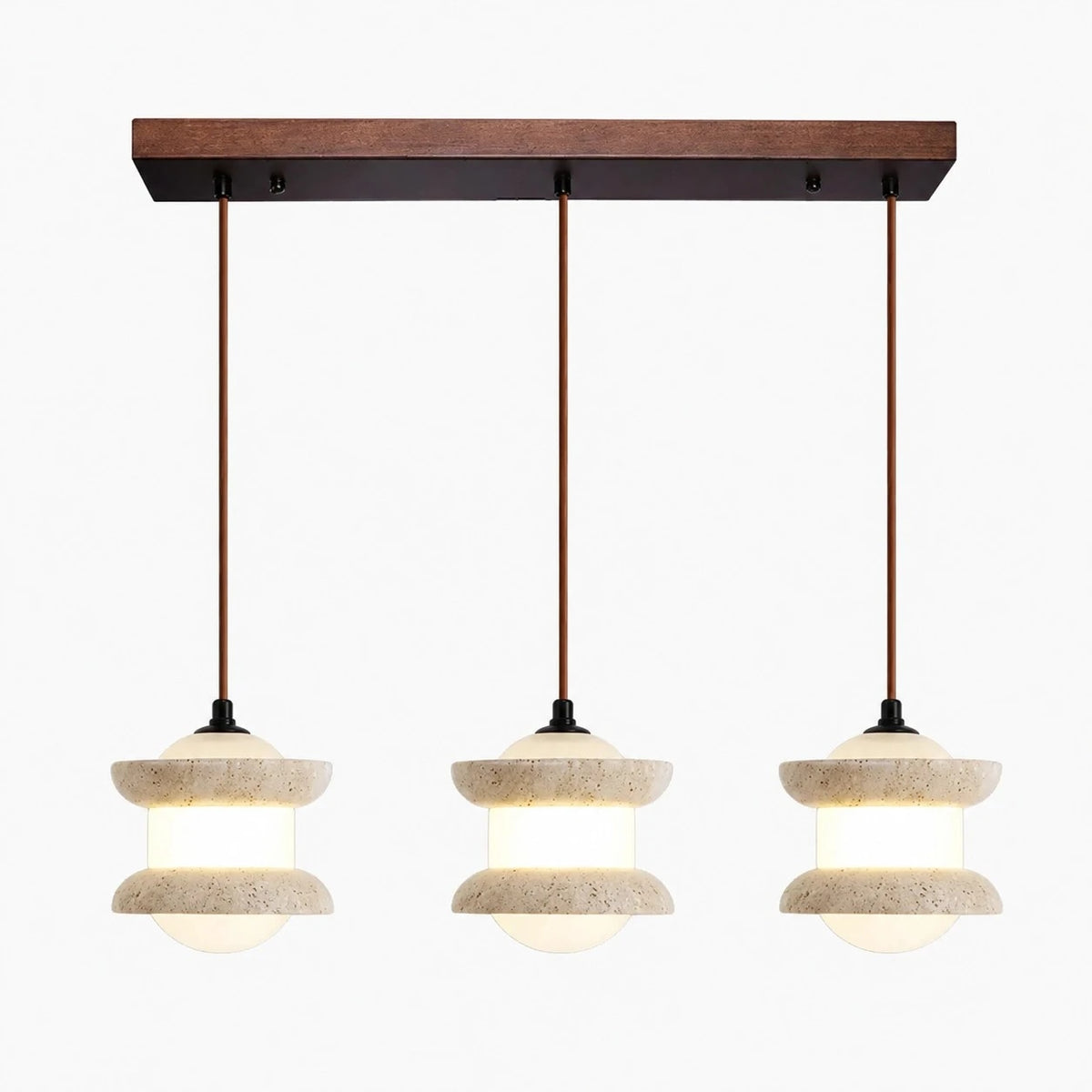 Three-light travertine stone pendant light on a plain background