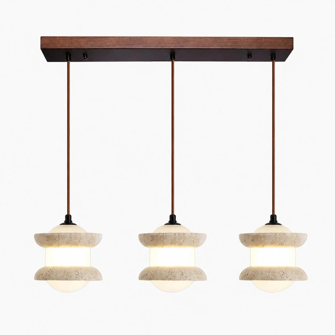 Three-light travertine stone pendant light on a plain background