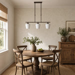Bild in die Galerieansicht laden, Strellux three-head Coffee Brown chandelier in a breakfast nook
