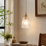 Charger l'image dans la visionneuse de la galerie, Style L clear glass pendant suspended near a bright window