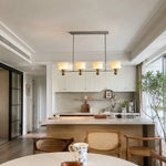 Cargar imagen en el visor de la Galería, Linear cream glass chandelier over a kitchen island