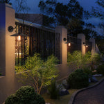 Bild in die Galerieansicht laden, Outdoor wall sconce along a garden path