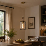 Cargar imagen en el visor de la Galería, Clear glass pendant installed above a dining table