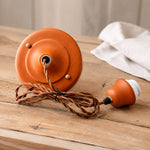 Cargar imagen en el visor de la Galería, Warm brown cord and ceiling hardware detail