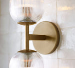 Load image into Gallery viewer, Bravira Ribbed Glass Sconce - Metal Wall Light with Clear Glass Shade
