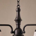 Afbeelding laden in galerijweergave, Close view of black iron center column and chain